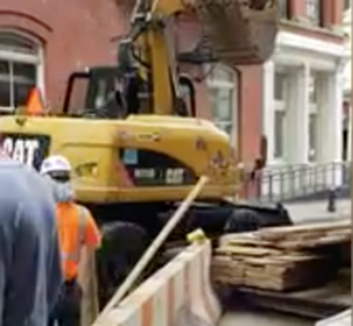 Construction to the Rescue: Workers Use Digger to Stop Looters from Making Off with Stolen Designer Goods